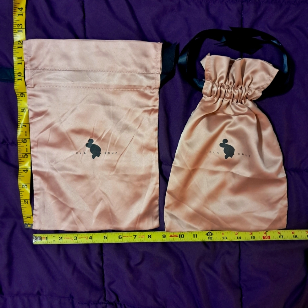 LOLA CRUZ dust bags
